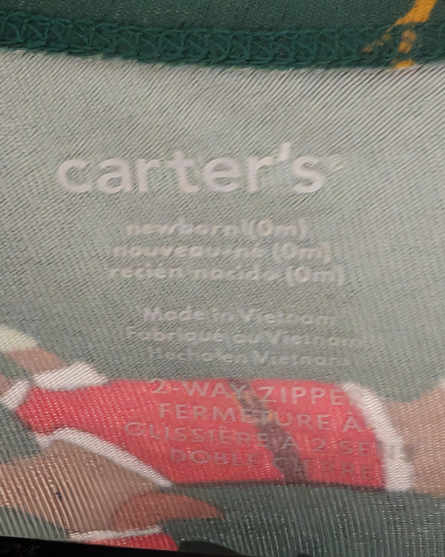 Carter’s Holiday Footed Sleeper – Newborn